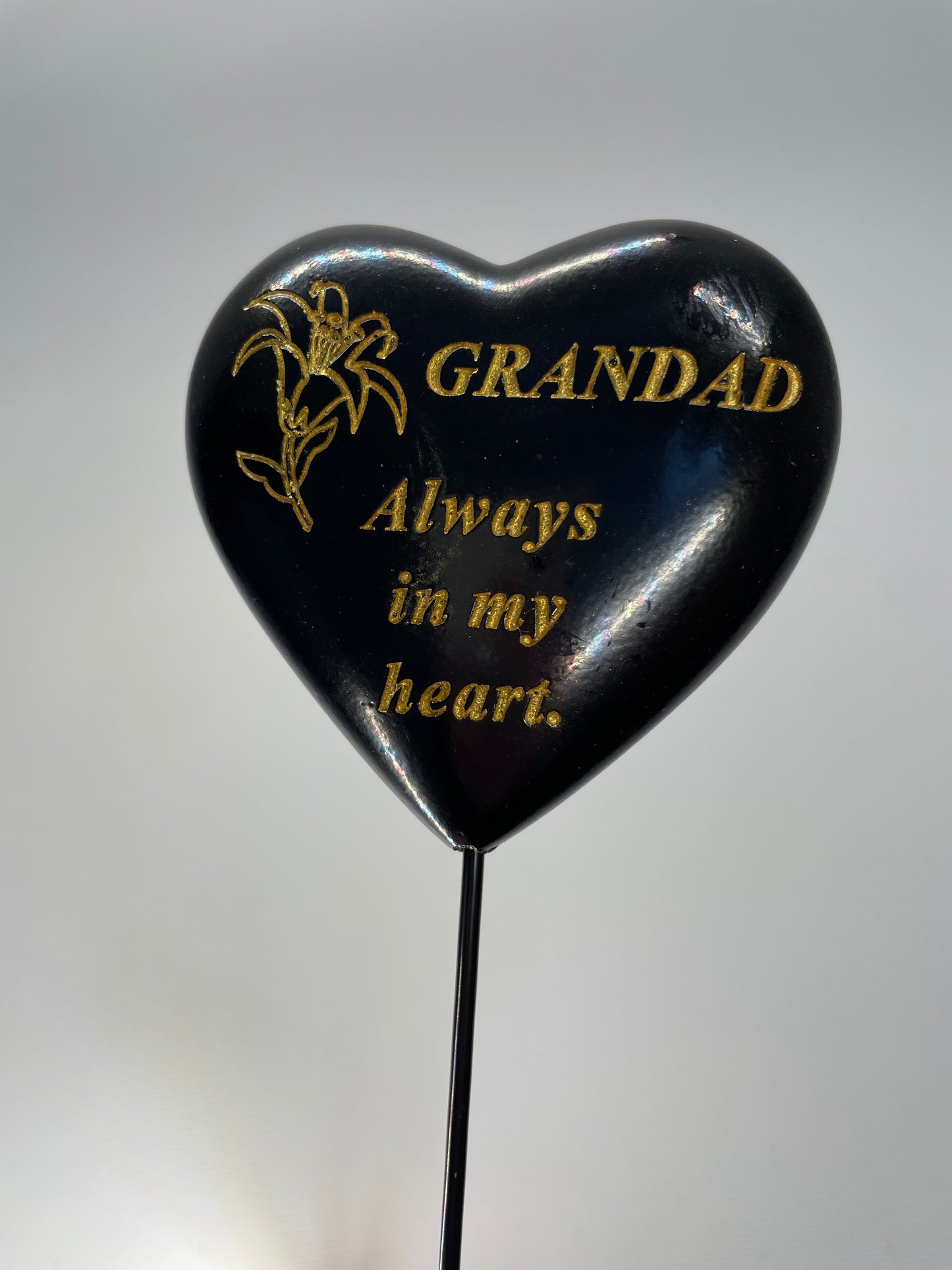 Black and gold, Grave memorial stick