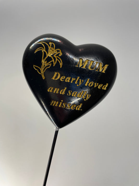 Black and gold, Grave memorial stick